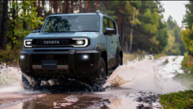 2026 Toyota Land Cruiser FJ front view with round LED headlights and rugged bumper